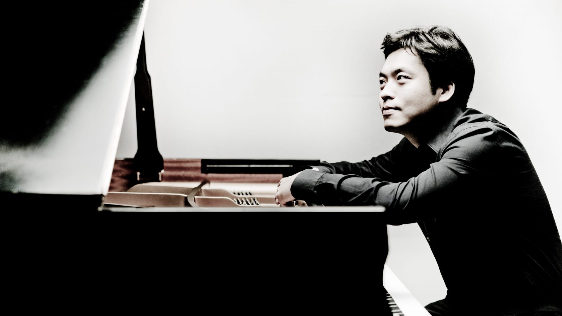 Sunwook Kim sitting at a Piano